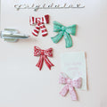Hand-Painted Stoneware Bow Shaped Magnet with Pattern